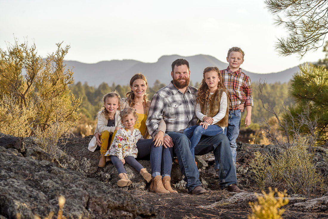 flagstaff family with small kids portrait at sunset crater