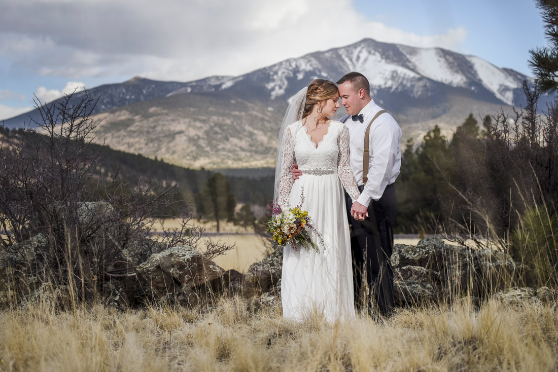 flagstaff winter wedding couple elopement snow on mountain